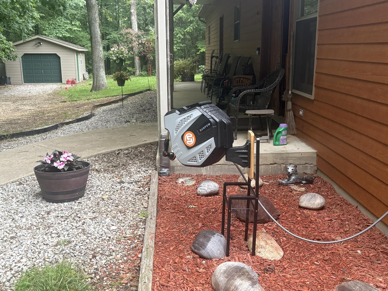 SUNPOW Retractable Garden Hose Reel - 1/2 inch x 50ft Heavy Duty Wall Mounted Hose Reel with 3/4 inch Brass Fitting & 10 Sprayer Nozzle - Any Length Lock, Auto Rewind System, 180 Degree Swivel Bracket- Grey customer photo 1