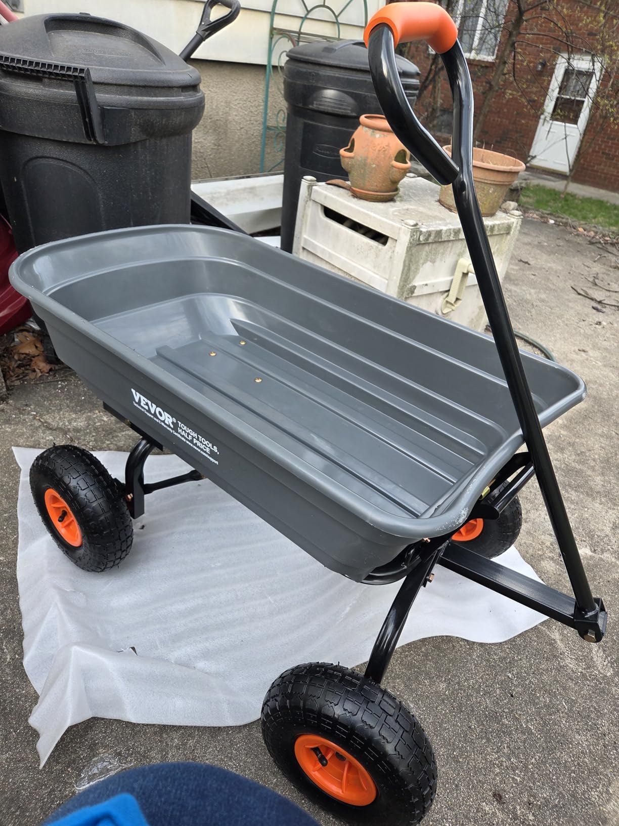 VEVOR 4 Cu.Ft. 600lbs Poly Garden Dump Cart, Heavy Duty 4 Wheel Wheelbarrow Yard Cart Dump Wagon with 10in All Terrain Wheels, Steel Frame and Quick Release System customer photo 1