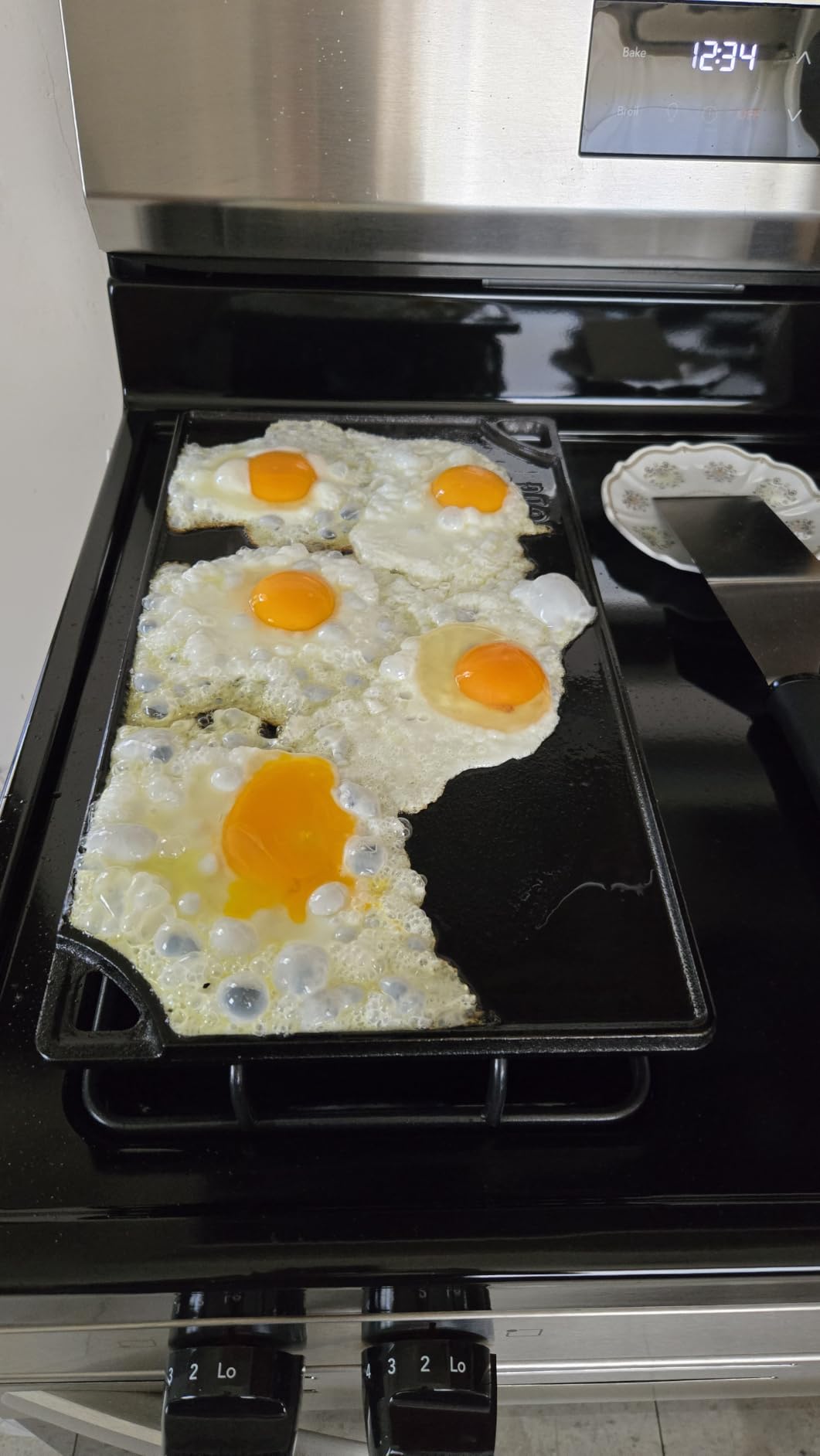 Lodge Reversible Cast Iron Grill/Griddle Pan, 16.75 x 9.5 Inches | Dual-Sided Double Burner Griddle for BBQ, Eggs, Pancakes & Burgers, PFAS-Free, Flat Top Cookware, Made in USA customer photo 2