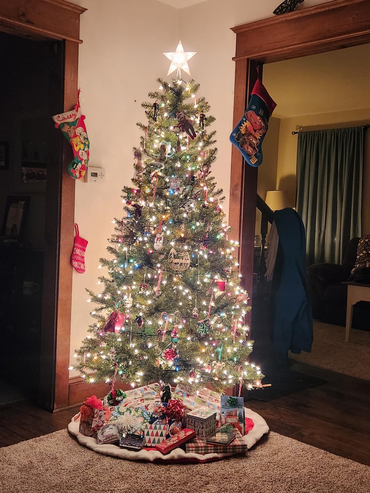 National Tree Company Pre-Lit Artificial Slim Christmas Tree, Green, Dunhill Fir, White Lights, Includes Stand, 12 Feet | 1,000 Clear Lights, 6,546 Tips, Includes Stand, Artificial, Green customer photo 1