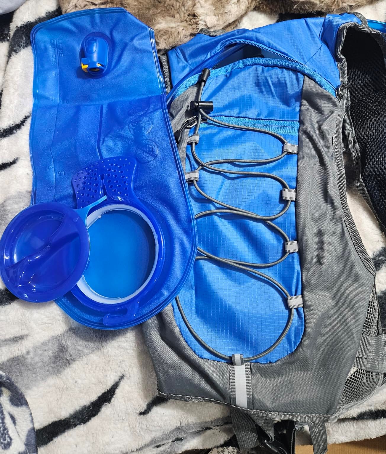 Unigear Hydration Pack Backpack with 2L Water Bladder for Hiking & Cycling | Lightweight Water Backpack For Running, Biking, Climbing And Camping, 70 Oz Bladder customer photo 2