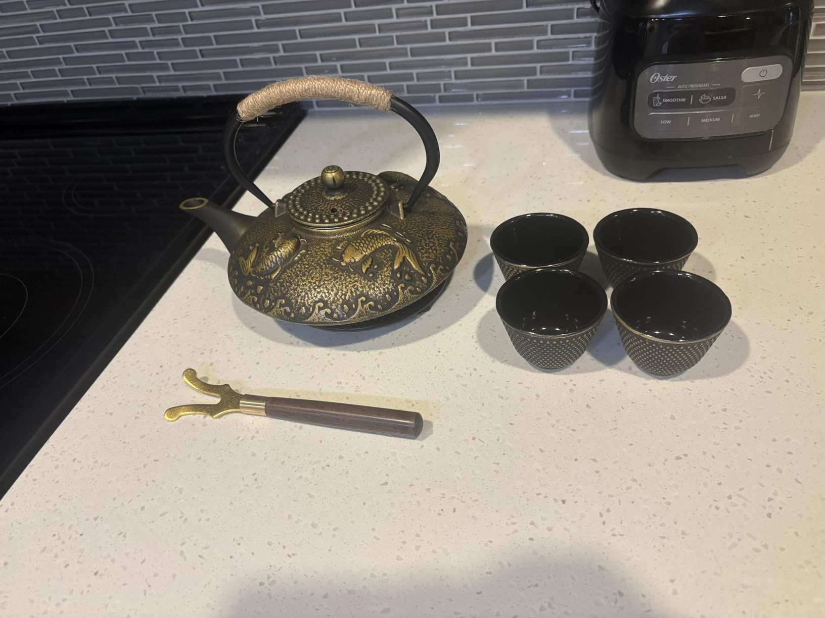 Ufine Blue Floral Cast Iron Teapot Set 28 oz Tea Kettle with 4 Cups, Trivet | Japanese Style Tetsubin for Stove Top with Stainless Steel Infuser for Loose Leaf Tea customer photo 2
