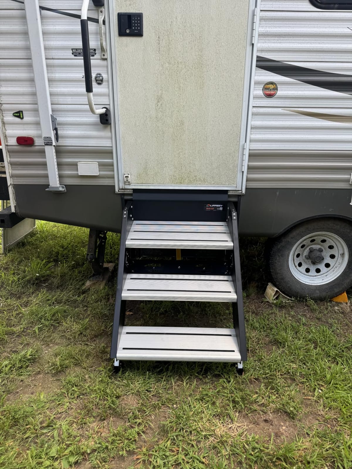 Lippert Components - 791572 Solid Step Triple Step for RV and Travel Trailer Entry Doorway Black 26-inch customer photo 1