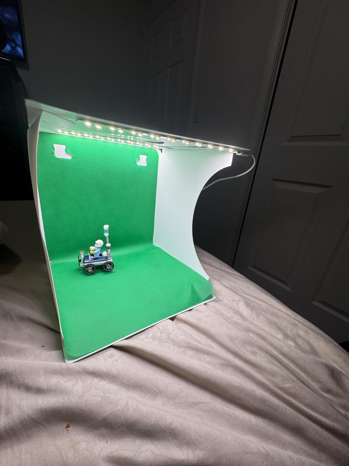 DUCLUS Mini Photo Studio Light Box, Portable Folding Photography Light Tent kit with 40pcs LED Light + 6 Kinds Color Backgrounds for Small Size Products customer photo 1