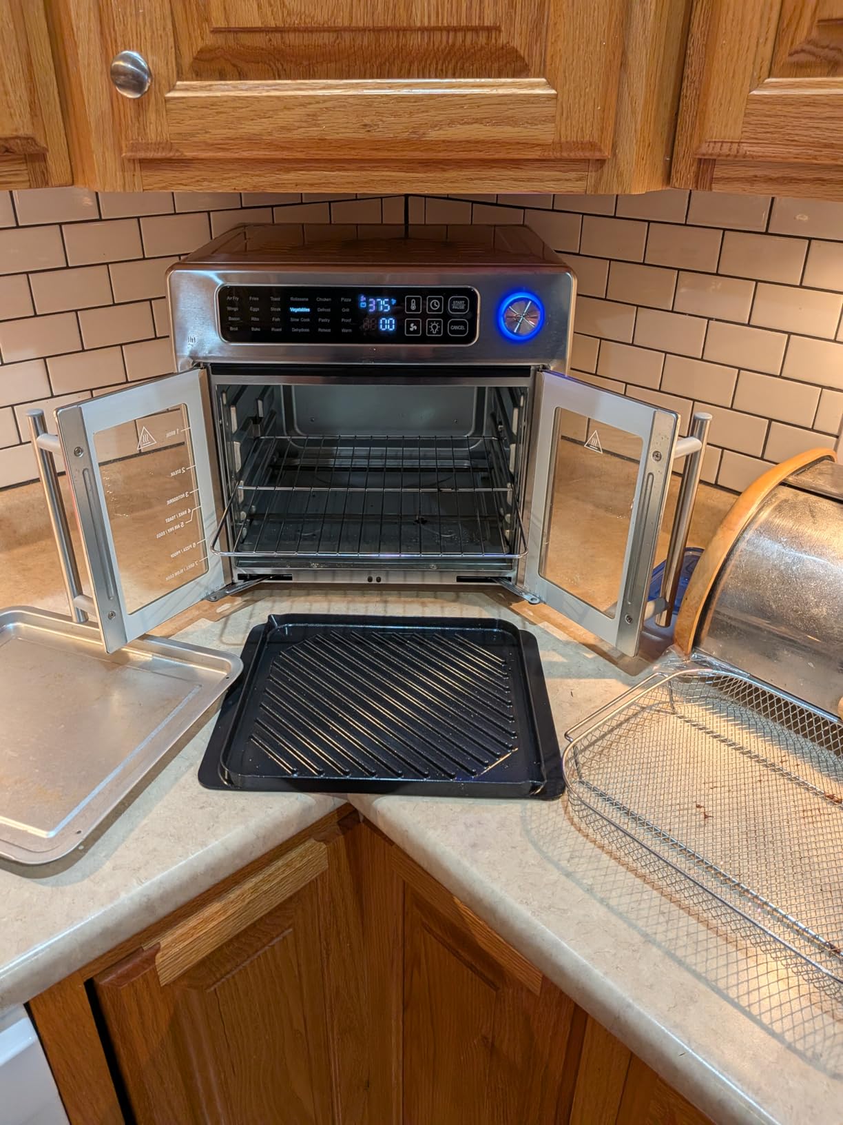 Emeril Lagasse 26QT French Door Multi-Function Air Fryer Toaster Oven | 26QT air fryer oven with French doors, 24 cooking functions, dual-speed fan and rotisserie for easy family meals customer photo 1