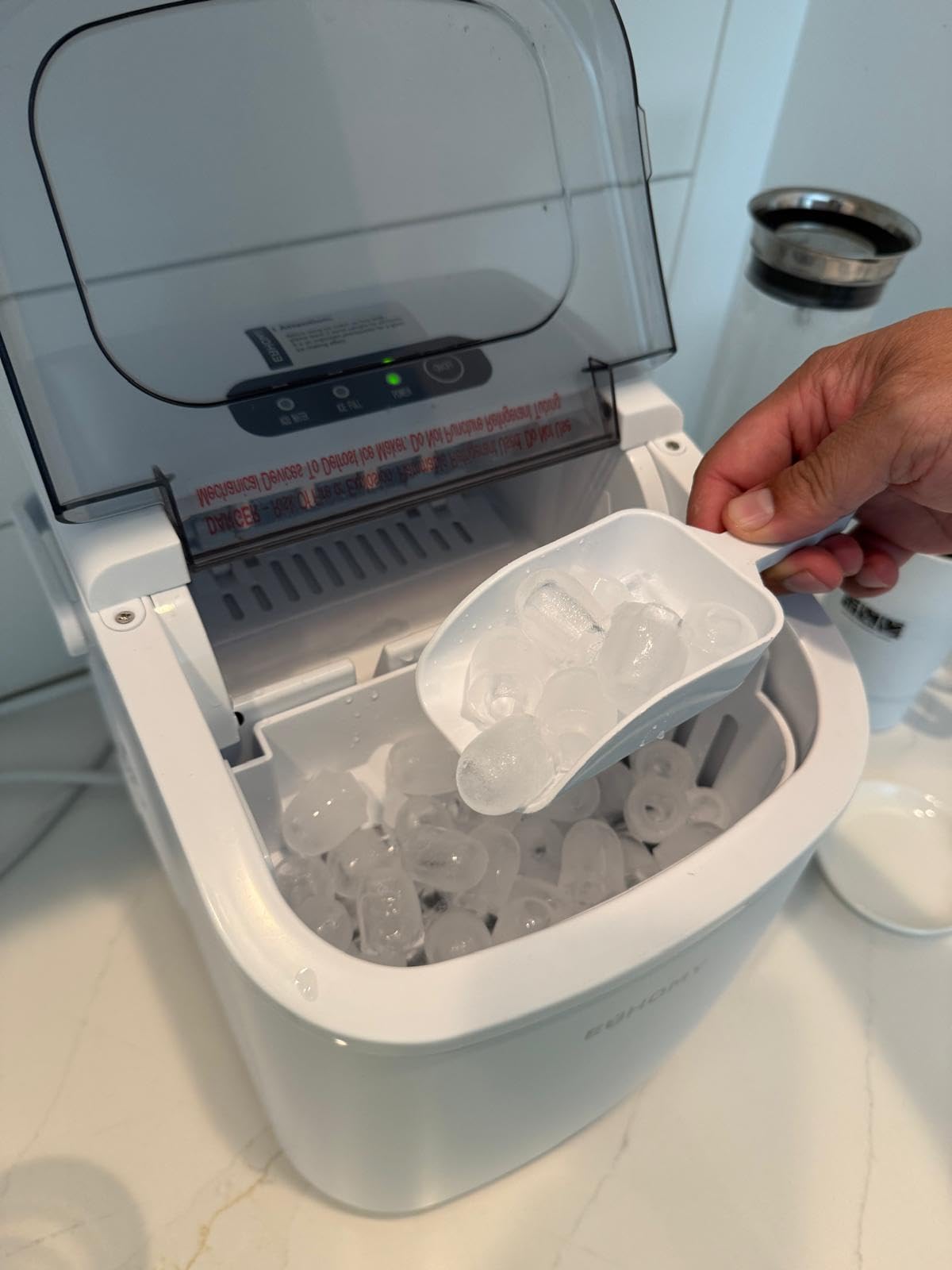 EUHOMY Countertop Ice Maker Machine with Handle, 26lbs in 24Hrs, 9 Ice Cubes Ready in 6 Mins, Auto-Cleaning Portable Ice Maker with Basket and Scoop, for Home/Kitchen/Camping/RV. (Black) customer photo 1