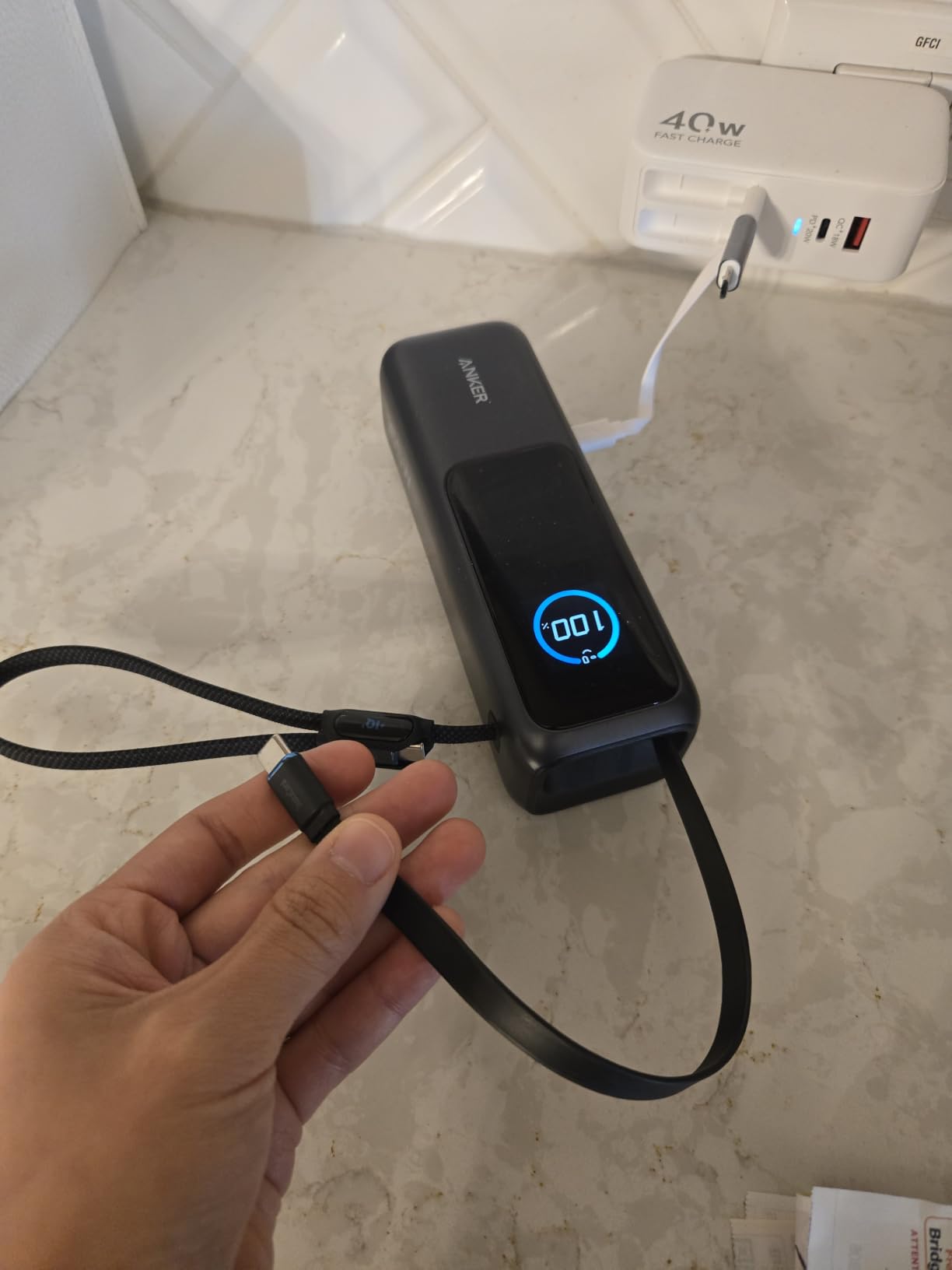 Anker Laptop Power Bank, 25,000mAh Portable Charger with 165W Total Output, 3 USB-C Ports (100W Max Each), Built-in Retractable Cables, Flight-Ready, for iPhone 17/16 Series, MacBook, Samsung, and More customer photo 1