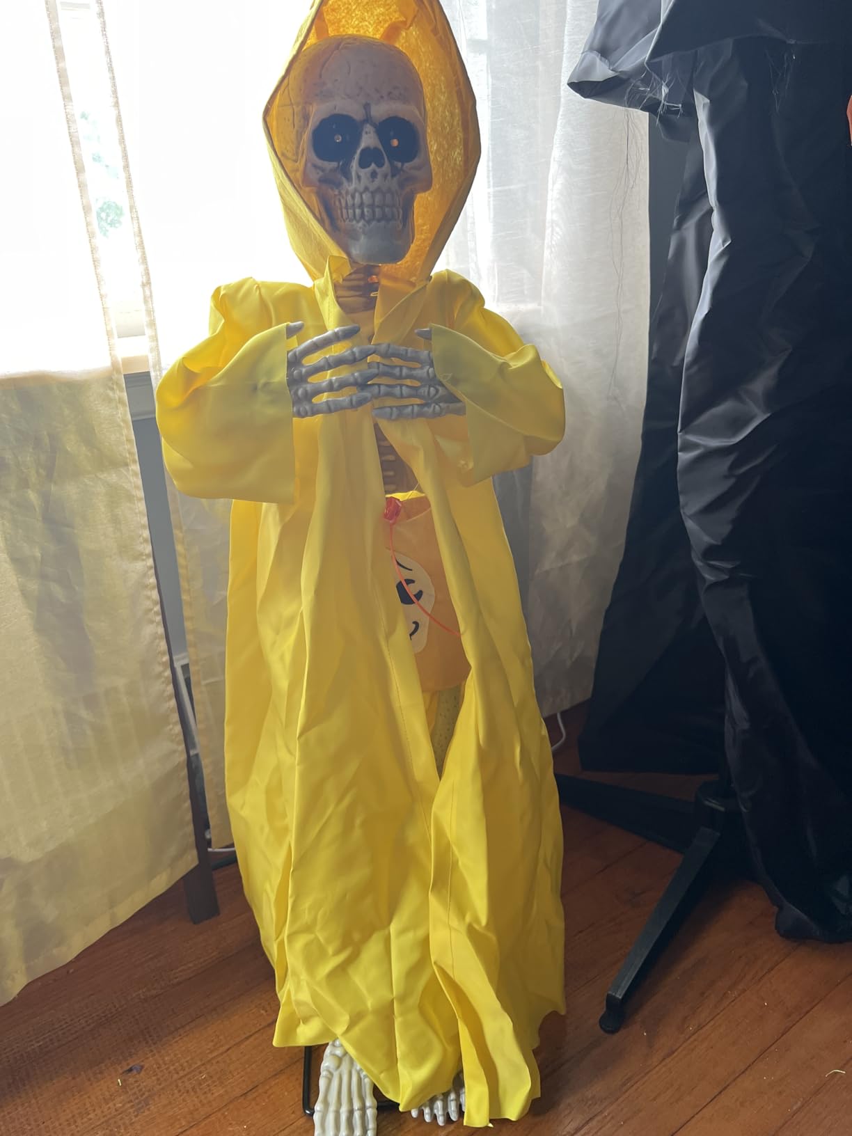 Halloween Animatronic Tombstone with Moving Skeleton - Sensor Activated Animated Scary Prop with Creepy Sound & Light-Up Eyes customer photo 1