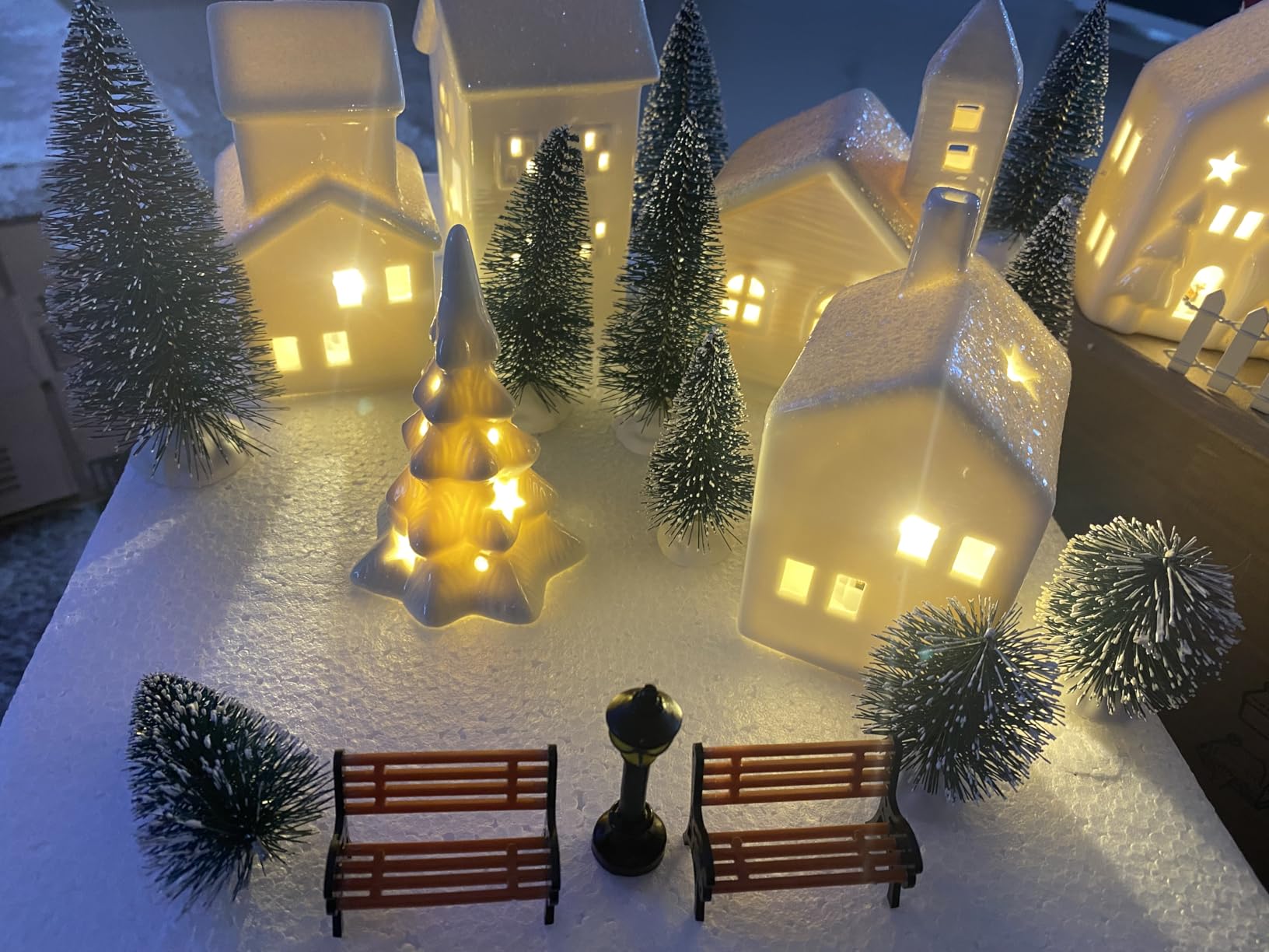 Fovths 42 Pieces Porcelain Christmas Village Set 9 Lighted LED Xmas Village Houses with 16 Xmas Trees, Withered Tree Lamp Fence Bench Winter Village Building Figurines for Holiday Tabletop Decor customer photo 1