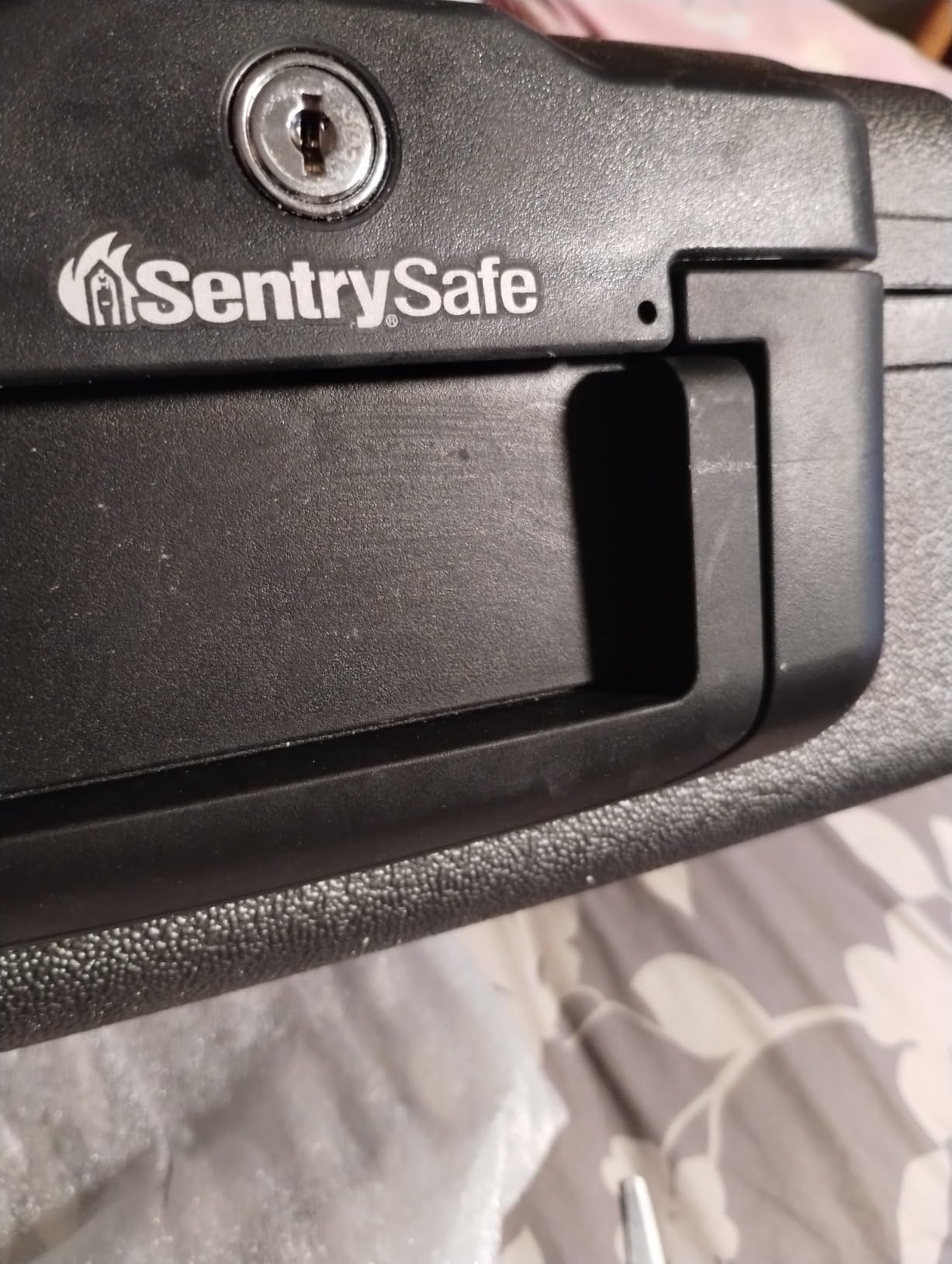 SentrySafe Fireproof Safe with Key Lock, Chest Lock Box for Home or Travel Secures Money, Documents, 0.18 Cubic Feet, 6.1 x 14.3 x 11.2 Inches, 1210 customer photo 1