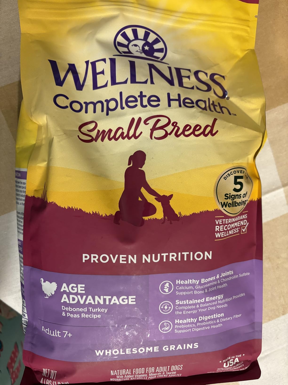 Wellness Complete Health Age Advantage Small Breed Senior Dry Dog Food, Wholesome Grain Kibble, Natural, Turkey and Peas Recipe, 4 lb Bag customer photo 1