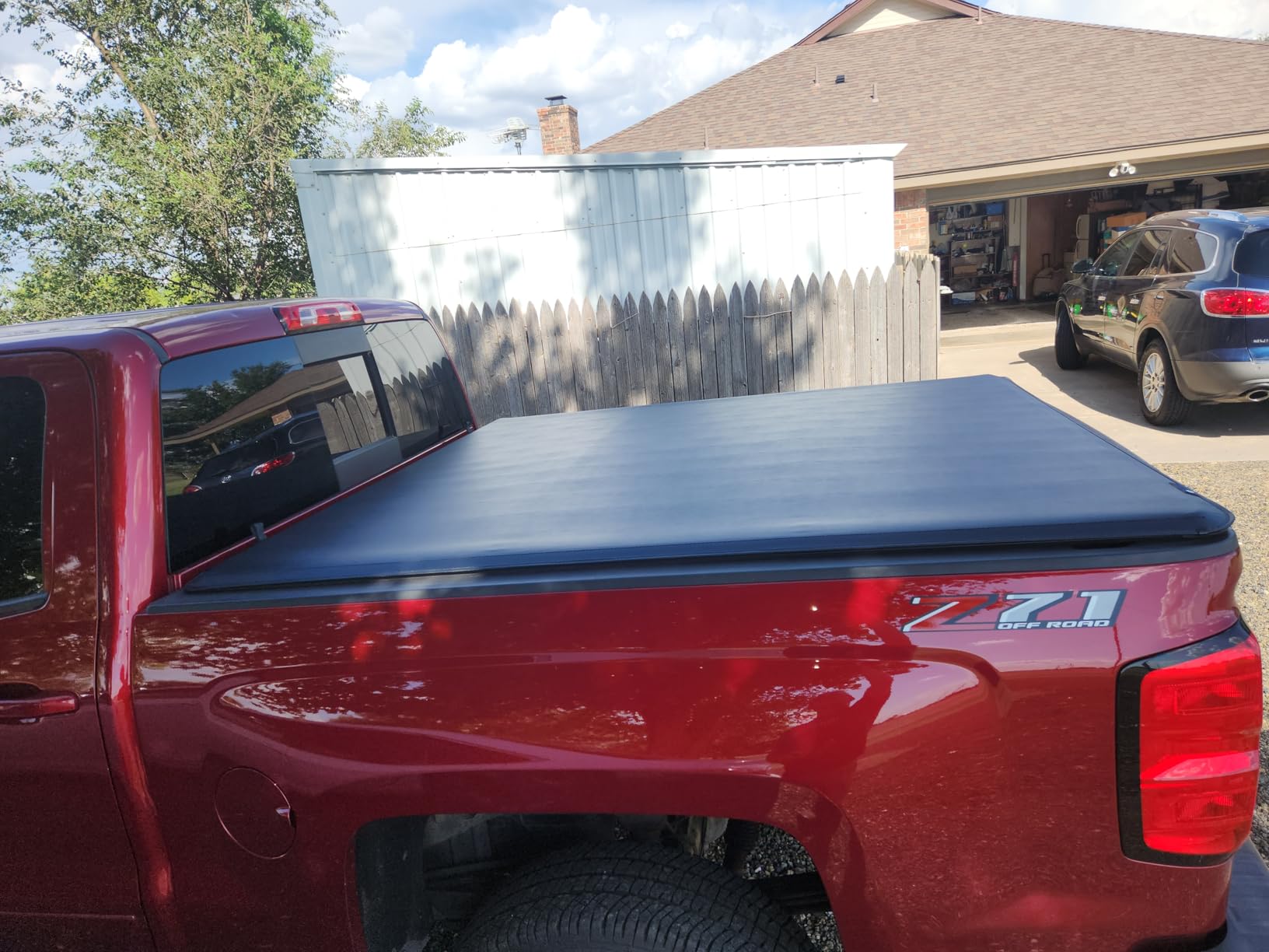 Tyger Auto T1 Soft Roll-up Truck Bed Tonneau Cover Compatible with 2014-2018 Chevy Silverado GMC Sierra 1500; 2019 LD/Limited | 5'9
