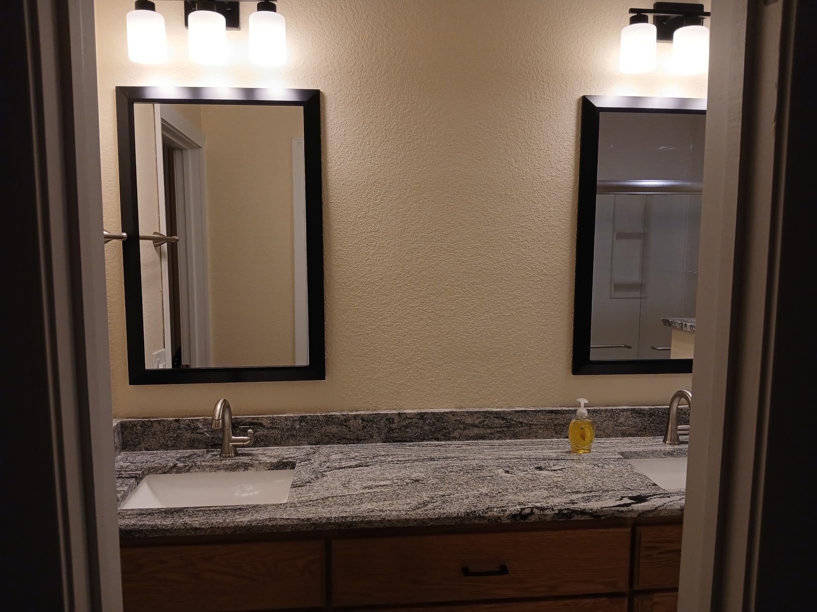 Briivue Black Metal Framed Bathroom Wall Mirror, 55x30 Inch customer photo 1
