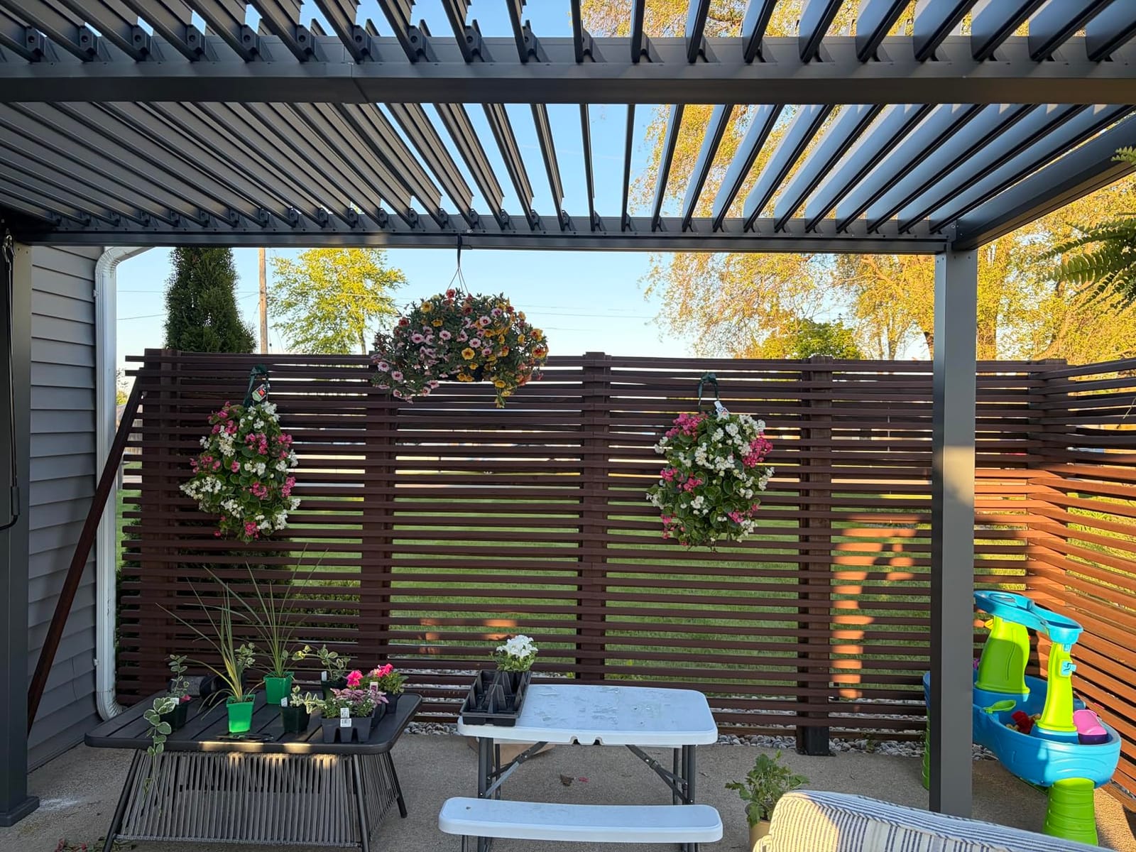 GarveeLife Louvered Pergola 10 ft x10', Outdoor Pergola with Adjustable Louvered Roof, Reinforced Aluminum Frame, Integrated Drainage System, Hardtop Gazebo for Patio, Deck, Wood Grain customer photo 2