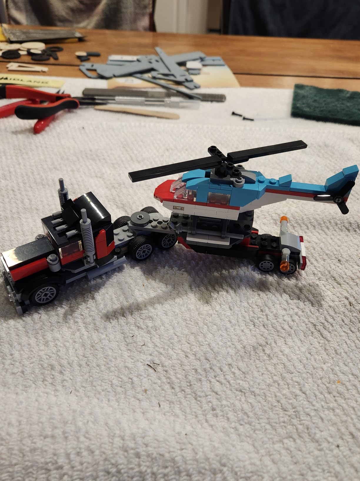 LEGO Creator 3 in 1 Flatbed Truck with Helicopter Toy, Transforms from Flatbed Truck Toy to Propeller Plane to Hot Rod and SUV Cars, Gift Idea for Boys and Girls Ages 7 Years Old and Up, 31146 customer photo 1