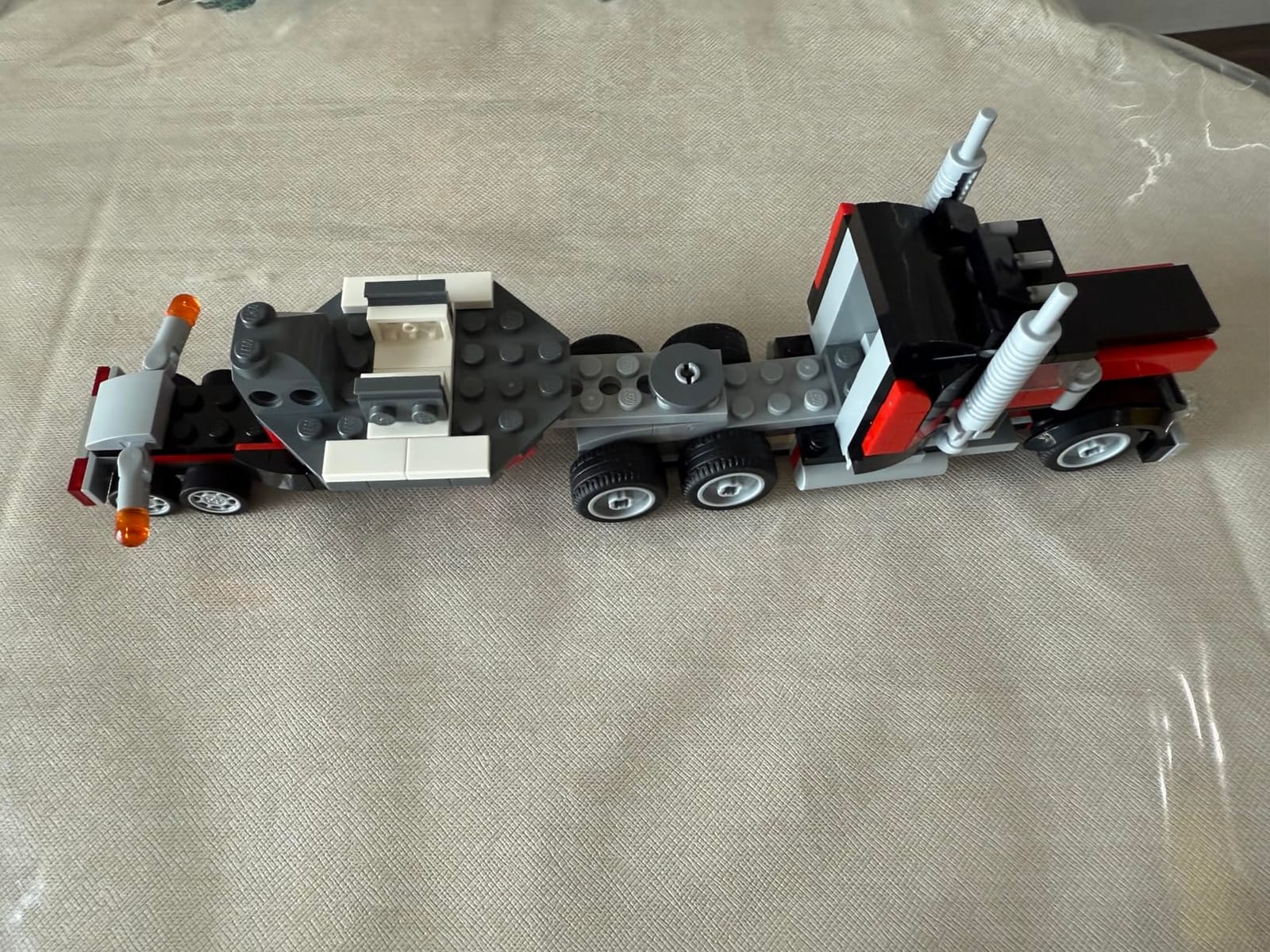 LEGO Creator 3 in 1 Flatbed Truck with Helicopter Toy, Transforms from Flatbed Truck Toy to Propeller Plane to Hot Rod and SUV Cars, Gift Idea for Boys and Girls Ages 7 Years Old and Up, 31146 customer photo 2